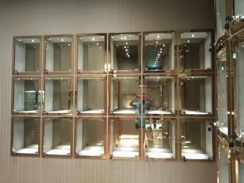 Glass display cabinet wall at The Chamber, Starhill